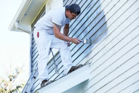 Procuts Paint team applying fresh exterior paint to a commercial property.